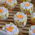 uncooked Siu Mai in a bamboo steamer basket.