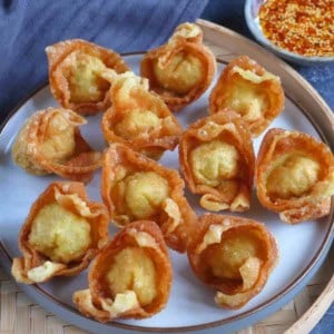 deep-fried wontons on a plate.