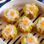 Siu Mai in steamer with overlay text that says pork and shrimp Siu Mai.