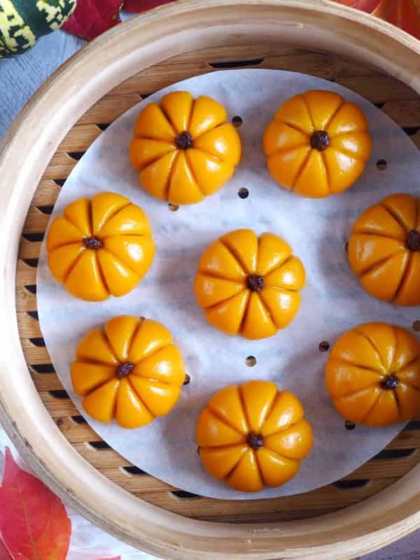 pumpkin mochi cakes in a steamer