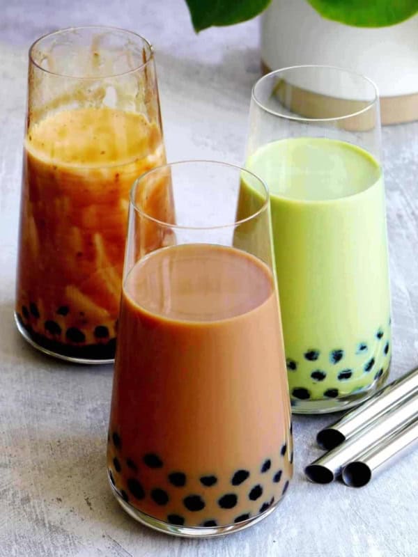Three glasses of bubble tea: classic, brown sugar and matcha